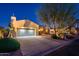 Inviting single-story home with a well-kept front yard, two-car garage, and desert landscaping at 22813 N Del Monte Dr, Sun City West, AZ 85375