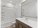 Modern bathroom featuring vanity with drawers, a shower and tub combo, and a toilet at 2460 E Athena Ave, Gilbert, AZ 85297