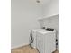 Convenient laundry room equipped with modern washer and dryer at 2460 E Athena Ave, Gilbert, AZ 85297