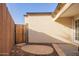 The backyard has desert landscaping and a small patio, offering a private outdoor space at 2638 E Edgemont Ave, Phoenix, AZ 85008