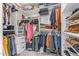 Organized walk-in closet with ample storage for clothes, shoes, and accessories at 2638 E Edgemont Ave, Phoenix, AZ 85008