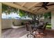 Relaxing outdoor patio area with shade and a dining table at 2824 N 42Nd Way, Phoenix, AZ 85008