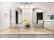 Bathroom with double sinks, decorative accents, and bright lighting at 2824 N 42Nd Way, Phoenix, AZ 85008