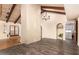 Dining room with wood beams, a chandelier, and a view of the laundry room at 2824 N 42Nd Way, Phoenix, AZ 85008