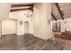 Living room with a chandelier, wood beams, and a view of the living room at 2824 N 42Nd Way, Phoenix, AZ 85008