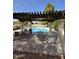 Enjoy the Arizona sunshine in this community pool area with outdoor seating and shade structure at 2824 N 42Nd Way, Phoenix, AZ 85008