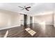 Spacious bedroom with wood floors and a barn door at 2977 E Teakwood Pl, Chandler, AZ 85249