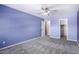 Tranquil bedroom with cool blue walls, plush carpet, and ample closet space for storage at 2977 E Teakwood Pl, Chandler, AZ 85249