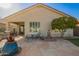 Backyard featuring pavers, mature landscaping and a covered patio at 30153 N Gecko Trl, San Tan Valley, AZ 85143