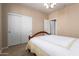 Comfortable bedroom with closet doors, neutral paint and carpet at 30153 N Gecko Trl, San Tan Valley, AZ 85143