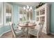 Bright breakfast nook featuring a round table, chair set, and chandelier lighting at 30153 N Gecko Trl, San Tan Valley, AZ 85143