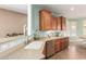 Stylish kitchen counter with stainless steel dishwasher, sink, and breakfast nook in the background at 30153 N Gecko Trl, San Tan Valley, AZ 85143