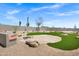 Scenic backyard features seating, fire pit and beautiful desert views at 30600 N Pima Rd # 24, Scottsdale, AZ 85266