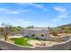 Scenic backyard featuring custom landscaping, fire pit, and spacious patio, ideal for entertaining at 30600 N Pima Rd # 24, Scottsdale, AZ 85266