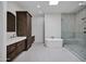 Beautiful bathroom with double vanity sinks, soaker tub, and walk-in shower at 30600 N Pima Rd # 24, Scottsdale, AZ 85266