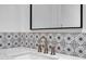 Close up of vanity with intricate tile work at 30600 N Pima Rd # 24, Scottsdale, AZ 85266