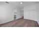 Clean bedroom features wood flooring, modern ceiling fan, and ensuite access at 30600 N Pima Rd # 24, Scottsdale, AZ 85266
