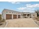 Beautiful desert home featuring a three-car garage and Southwestern architectural details at 30600 N Pima Rd # 24, Scottsdale, AZ 85266