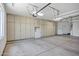 Spacious garage with ample storage cabinets, offering plenty of room for vehicles and storage at 30600 N Pima Rd # 24, Scottsdale, AZ 85266