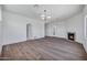 Bright living room featuring fireplace, recessed lighting, and hardwood floors at 30600 N Pima Rd # 24, Scottsdale, AZ 85266