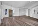 Expansive living room showcasing hardwood floors, high ceilings, modern lighting, and plenty of natural light at 30600 N Pima Rd # 24, Scottsdale, AZ 85266