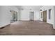 Bright and open living space features beautiful flooring and a large sliding glass door with lots of natural light at 30600 N Pima Rd # 24, Scottsdale, AZ 85266