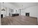 Open-concept living room featuring recessed lighting, fireplace, and an island at 30600 N Pima Rd # 24, Scottsdale, AZ 85266