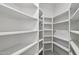 Walk-in pantry with ample shelving space, perfect for organized storage at 30600 N Pima Rd # 24, Scottsdale, AZ 85266