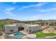 Beautiful backyard featuring a sparkling pool and landscaped area perfect for relaxation and outdoor enjoyment at 30600 N Pima Rd # 24, Scottsdale, AZ 85266