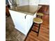 Beautiful kitchen island with seating and wood countertop, great for casual dining at 34705 N 26Th Ave, Phoenix, AZ 85086