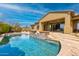 Stunning backyard showcasing a pool with spa, water feature, and patio, perfect for outdoor entertaining and relaxation at 37654 N 102Nd Pl, Scottsdale, AZ 85262