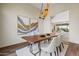 Elegant dining area with modern decor and a large table that seats six perfect for Gathering gatherings and entertaining at 37654 N 102Nd Pl, Scottsdale, AZ 85262