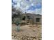 Desert home with drought tolerant landscaping and mature cacti create a unique curb appeal at 37654 N 102Nd Pl, Scottsdale, AZ 85262