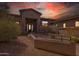 Inviting desert home with a well landscaped entry and a covered front porch at 37654 N 102Nd Pl, Scottsdale, AZ 85262