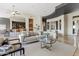 Comfortable living room area with a view into kitchen at 37654 N 102Nd Pl, Scottsdale, AZ 85262