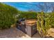 Outdoor kitchen with built-in grill, perfect for entertaining in the backyard at 37654 N 102Nd Pl, Scottsdale, AZ 85262