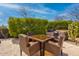 Outdoor dining area with patio table and grill perfect for backyard dining at 37654 N 102Nd Pl, Scottsdale, AZ 85262