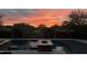 Backyard pool and spa area showcasing a serene desert sunset in the background at 37654 N 102Nd Pl, Scottsdale, AZ 85262