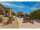 Enjoy outdoor living with a private pool, patio, and lush desert landscaping at 37654 N 102Nd Pl, Scottsdale, AZ 85262