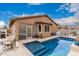 Beautiful backyard with pool and patio, a great space to enjoy the outdoors at 38062 W San Capistrano Ave, Maricopa, AZ 85138