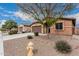 Charming single-story home with a two-car garage and low-maintenance desert landscaping at 38062 W San Capistrano Ave, Maricopa, AZ 85138