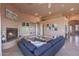 Cozy living room featuring a fireplace, built-in shelving, and comfortable seating at 40262 N 107Th Pl, Scottsdale, AZ 85262