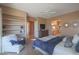 Inviting main bedroom with sitting area, ensuite access, and beautiful natural light at 40262 N 107Th Pl, Scottsdale, AZ 85262