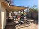 Back patio featuring an outdoor kitchen area with a grill and furniture on a sunny day at 4101 E Nancy Ln, Phoenix, AZ 85042