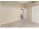 Bedroom featuring carpet flooring, light neutral walls, and ensuite bathroom at 4109 E Del Rio St, Gilbert, AZ 85295