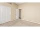 Bedroom with carpet flooring, a ceiling fan, and a closet at 4109 E Del Rio St, Gilbert, AZ 85295