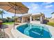 Cozy outdoor kitchen featuring a grill and countertop, complete with a covered dining area and patio at 43851 W Griffis Dr, Maricopa, AZ 85138