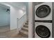 Hallway with carpeted staircase and new LG washer dryer at 4655 S Glacier --, Mesa, AZ 85212