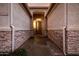 The front entryway with stacked stone accents and a covered porch provides a welcoming curb appeal at 4662 W Fallen Leaf Ln, Glendale, AZ 85310