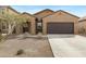 Inviting single-story home featuring a neutral exterior and a well-kept front yard at 47737 W Coe St, Maricopa, AZ 85139